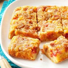 a white plate topped with squares of food