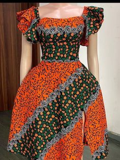 Beauty per excellence!! This dress will give you all the Elegance you need,with a catchy colour made for all skin type... My stunning dress is made with 100% cotton African print. This dress is made to order so customisation are very much welcomed.We can add or remove anything you wish.You are welcome to request a fabric change as well.We have lots of fabric options available. If you have any question please do well to start a chat. Thank you so much! Stylish Ankara Tops For Ladies, Trending Ankara Gown Styles 2023, 2023 Ankara Styles For Ladies, Fitted Maxi Dress With Traditional Patterns, Orange Fitted Maxi Length Gown, Fitted Orange Maxi Length Gown, Fitted Dress With Traditional Patterns And Short Sleeves, Fitted Maxi Gown With Traditional Patterns, Fitted Maxi Length Gown With Traditional Patterns