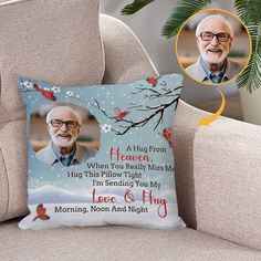 an old man with glasses is sitting on a couch next to a pillow that says, i love you and hug