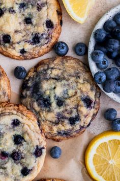 blueberry muffins and lemon slices on a table