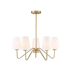 a brass chandelier with five white shades