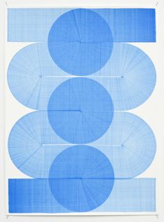 blue circles are arranged on white paper