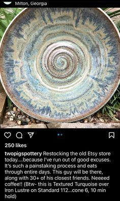 a bowl sitting on top of a pile of dirt