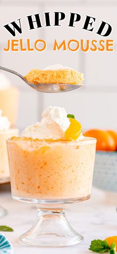 an image of a dessert with whipped cream and oranges in the background text reads, whipped jello mousse