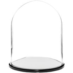 a clear glass dome on a black base with a white surface in the center and bottom