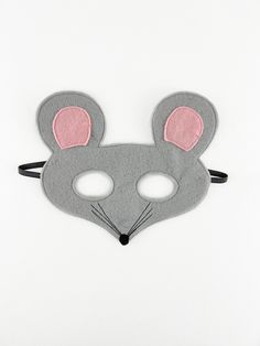 The gray felt mouse mask is top stitched with two layers of eco-fi felt for quality and durability. It stays securely in place with a 1/4" black elastic band in the back. The mask is approximately 7" tall and  7" wide and made to fit a child's face. Measure your child's head (around where the mask would go) for the best fit. Small - 17" around unstretched - fits 18 months to 3 years old Medium - 19" unstretched - fits 3 to 5 years old Large - 20" unstretched - fits 6 years old and up (may fit a small adult, a $5 additional fee will apply if you need a bigger mask) Your child can scurry for cheese with this gray felt mouse mask and a little imagination. Add a matching gray top and bottom and you have a complete costume for a school play, Halloween or themed birthday party! With just a few p Mouse Mask For Kids, Preschool Mouse, Mouse Mask, Mask Halloween Costume, Ballet Costume, Mouse Costume, Felt Mask, Bird Masks, Felt Mouse