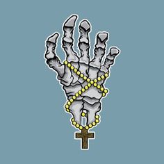 a hand that has beads on it with a cross in the middle and yellow beads around it