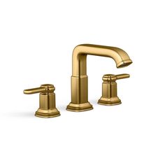 a gold faucet with two handles