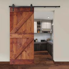 an open sliding barn door in a kitchen