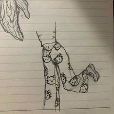 a drawing of a woman's leg with hello kitty on it and an umbrella