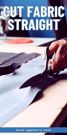 a person cutting fabric with scissors on top of a piece of paper that says cut fabric straight