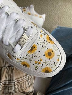 Customized AF1's with hand-painted sunflower design! This design is painted on brand new white women's Nike Air Force 1 '07's (come with box). Unlike my other listing, this design is also painted on the toe boxes of the shoe. These shoes are made to order, so I do not accept returns/refunds. Shoes are painted with Angelus leather paint and then sealed with a waterproof matte acrylic finisher (also Angelus brand). Feel free to message me with any questions you might have about this product :) Custom White Sneakers For Spring, Hand Painted White Custom Sneakers For Summer, White Custom Sneakers For Summer Streetwear, Trendy White Custom Sneakers For Spring, Yellow Casual Custom Artwork Sneakers, Casual Yellow Custom Artwork Sneakers, Cute Converse Shoes, Painted Shoes Diy, Custom Sneakers Diy