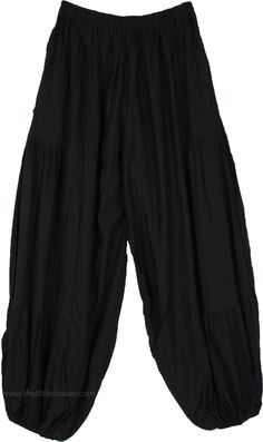 These perfect pair of loose rayon harem pants - without the usual tie-dye- are just what you may need for the season, with their comfy fabric and snug waist they are sure to make you feel great.  The pants have an elastic waist and elastic on the ankles for ease of comfort. #tlb #SplitSkirtsPants #Yoga #blackhippieharempants #gypsyblackpants Black Boho Clothes, Solid Cotton Bohemian Harem Pants, Solid Bohemian Cotton Harem Pants, Comfortable Black Wide-leg Harem Pants, Spring Solid Harem Pants, Relaxed Fit Solid Harem Pants, Solid Relaxed Fit Harem Pants, Loosely Fitted Rayon Harem Pants With Elastic Waistband, Haram Pants