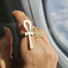 Ankh Ring Silver, gold, statement ring, Egypt, protection a Symbol of Eternal Life. Embrace the timeless symbolism of the Ankh with this beautifully crafted ring, available in both gold and silver.  The Ankh, known as the ancient Egyptian symbol of eternal life, is elegantly represented in this design, making it a powerful statement piece. The ring's sleek and minimalist design allows the symbol to shine, while the choice of gold or silver adds a touch of luxury and sophistication.  Perfect for Symbolic Engraved Open Ring Jewelry, Symbolic Hand Forged Open Ring, Spiritual Engraved Open Ring Jewelry, Hand Forged Open Symbolic Ring, Symbolic Hand Forged Ring Jewelry, Spiritual Yellow Gold Promise Ring Jewelry, Symbolic Engraved Open Ring, Tarnish Resistant, Symbolic Hand Forged Engraved Ring As Gift, Symbolic Engraved Open Ring Tarnish Resistant