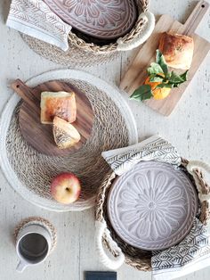 an assortment of food on plates and serving trays