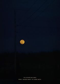 the full moon is shining brightly in the dark sky above power lines and telephone poles