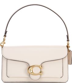 From COACH&#x2C; the Tabby 26 Pebble Leather Gold Tone Shoulder Bag features: Polished pebble leatherSnap closureLeather liningInside zip&#x2C; multifunction pocketsDetachable short strapDetachable long strap for shoulder/crossbody wearApprox. 10.25" L x 6" H x 3.25" W bag; 7" short strap drop; 21" long strap drop Imported. Luxury Coach Pebbled Leather Shoulder Bag, Elegant White Pebbled Leather Shoulder Bag, Summer Bag Essentials, Coach Tabby 26, Couch Bag, Coach Tabby, Crocheted Bags, Trendy Shoulder Bag, Polished Pebble