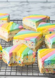 there are many pieces of cake on the cooling rack