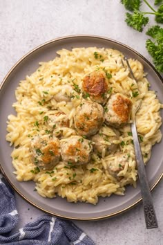 chicken meatballs and creamy garlic orzo on a plate