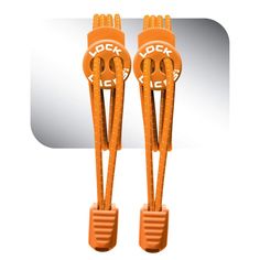 two orange plastic cable protectors are shown in front of a white square button with the word rock on it