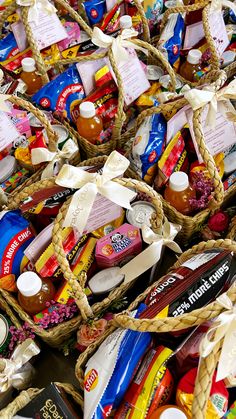 baskets filled with candy and confection sitting on top of a table next to each other