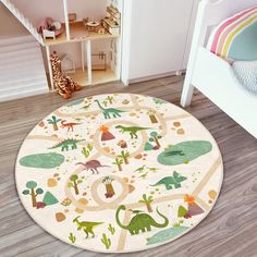 a child's play area with toys and rugs in the shape of dinosaurs