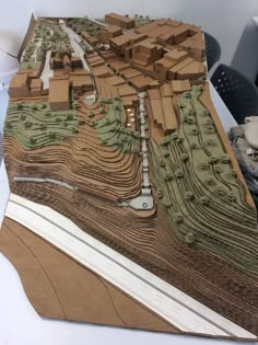 a model of a city is shown on a table