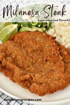 One milanesa steak on a plate with white rice, salad, and lime wedges on the side. Milanesa Pork Chops, Milanesa Meat Recipes, How To Make Milanesa Steak, Beef Milanesa Recipe Dinners, Beef Milanese Recipes, Milanesa Recipe Steak Easy, Steak Milanesa Recipe, Beef Escalope Recipe, Milanesa Recipe Steak Mexican