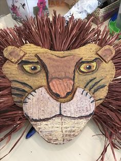 a paper mache of a lion's head