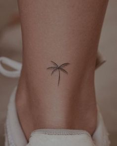 The 90 Most Popular Symbols For Travel Tattoos | Unique & Cute Travel Tattoo Ideas 3 Palm Trees Tattoo, Tiny Tattoos Palm Tree, Fine Palm Tree Tattoo, Small Tattoo Palm Tree, Palm Tree Line Art Tattoo, Unique Palm Tree Tattoo, Palm Tree Tattoo With Words, Palms Tattoo Ideas, Palm Tree Turtle Tattoo