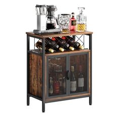 a wine rack with bottles and glasses in it on top of a wooden table next to a coffee maker