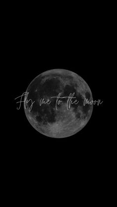 the words fly me to the moon written in cursive writing on a black background