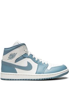 the air jordan 1 mid is available in blue and white