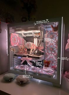 the inside of a pink and white computer case