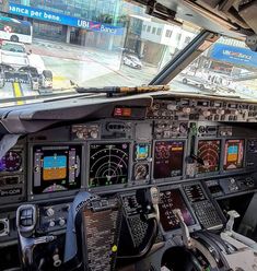 the cockpit of an airplane with multiple instruments and dashboards on it's sides