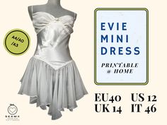 the dress is white and has ruffles on it, as well as an advert