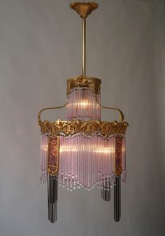 a pink chandelier hanging from the ceiling