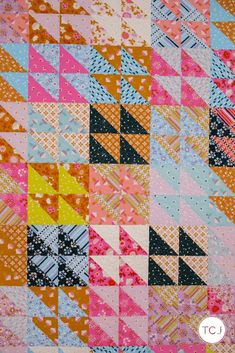 a colorful patchwork quilt with different colors