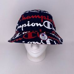 Nwt Champion Logo Script Bucket Hat L/Xl Blue All Over Print Spellout Beach Letter Print Visor Hats For The Beach, Beach Visor Hat With Letter Print, Blue Retro Vacation Hats, Navy Bucket Hat With Short Brim, Navy Casual Bucket Hat With Short Brim, Casual Navy Bucket Hat With Short Brim, Retro Blue Bucket Hat For Summer, Blue Casual Visor Sun Hat, Casual Multicolor Letter Print Hats