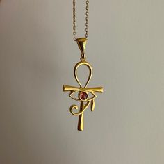 Minimal ANKH Necklace, Modern Eye of Ra Pendant, Ankh with Eye of Horus, Mythological Jewelry, Key of Life, Gold Symbol Charm, Gift for Her 𓋹  Ankh with Eye of Ra Pendant  The Key of Life now got stronger with the Eye of Horus.  Complete your outfit with a stylish and modern talisman Product Details, - Carefully produced with high quality Certified 925k Sterling Silver - 14k Gold Plated and Silver color options are available - Natural Tourmaline Gemstone - Height of the pendant: 2 cm (0.8 inche Gold Symbol, Key Of Life, Ankh Necklace, Eye Of Ra, Egyptian Jewelry, Eye Of Horus