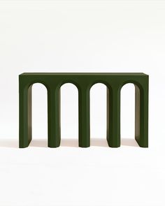 a green table with three columns on the top and one at the bottom, in front of a white background