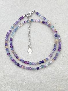 Purple Fluorite Choker, Stone Beaded Necklace, Crystal Choker, Fluorite Chain, Healing Crystal Necklace, Dainty Jewelry Gift for her. This purple fluorite dainty choker is fun and easy to wear and match with any outfit. They can express your style, mood, or personality in a subtle and charming way. It is perfect for anyone who loves minimalist style, natural stones. It is a unique and meaningful gift for yourself or someone special. You can wear it by itself or mix it with other necklaces for a Dainty Choker, Purple Fluorite, Stone Beaded Necklace, Crystal Choker, Chain Extenders, Necklace Crystal, Necklace Dainty, Choker Necklaces, Dainty Jewelry