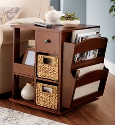 a living room with a couch, chair and bookcase on the floor next to a coffee table