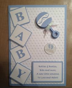 a blue and white baby's first birthday card