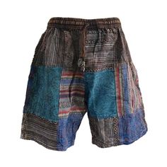 Unisex handsewn patchwork shorts made in Nepal. These high quality shorts are thicker and more durable than your standard cotton shorts. Features:  - As these are handmade the locations of the patches may vary. However, the general colour will remain the same. - Elastic waist with a draw string - 2 side pockets - 1 back pocket Sizes:  *As these are handmade these dimensions may vary slightly M: *        Elastic waist: 68-106cm *        Outseam: 51cm *        Inseam: 21cm L: *        Elastic wais Summer Patchwork Shorts, Blue Cotton Patchwork Shorts, Hippie Blue Patchwork Bottoms, Multicolor Hippie Shorts For Festival, Blue Bohemian Style Shorts For Festival, Bohemian Cotton Shorts, Bohemian Blue Shorts For Festival, Blue Bohemian Shorts For Festival, Blue Cotton Festival Shorts