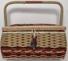 a woven basket with handle and handles