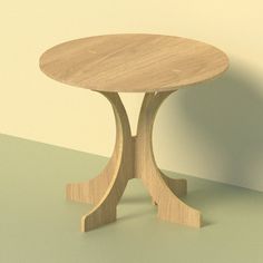 a small wooden table sitting on top of a green floor next to a white wall