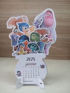 an image of a calendar with cartoon characters on it