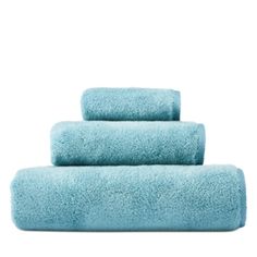 three blue towels stacked on top of each other