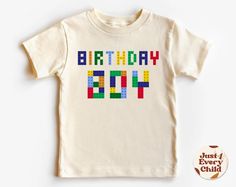 a t - shirt with the words birthday on it and lego blocks in different colors